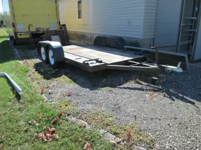 CAR HAULER. 14ft-76in between fenders-solid axle (no springs)-2in ball-ramps. Less than 200km on whe...
