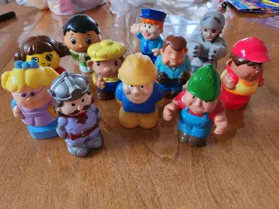 A variety of little toy people, View more