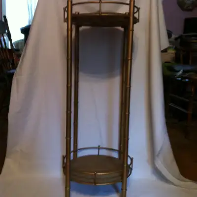 VINTAGE CAST IRON PLANT HOLDER, View more
