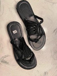 Black flat braided sandals