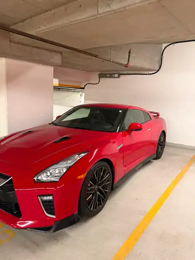 Red 2023 Nissan GTR Full PPF on front end of the car along with doors and mirrors. Ceramic coated on...