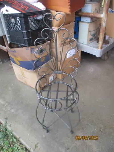 Selling quickly at 40.00 ..its 11 inches across x 33 inches tall in size..will hold up to a 10 3/4 i...