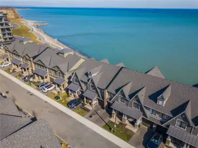 This executive 3-bedroom, 4-bathroom waterfront townhouse offers a luxurious living lifestyle with s...