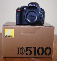 Nikon D5100 camera body kit with lens  for sale