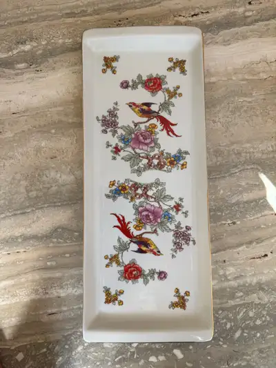 Elevate your space with this elegant Herend Hungary serving tray, showcasing a beautiful bird and fl...