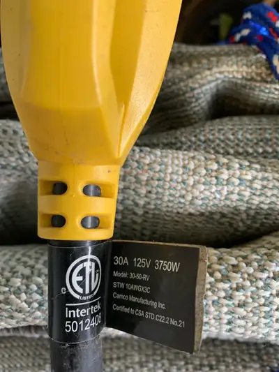 Looking to sell a used Camco Power Grip 30A-50A RV adapter, designed to connect a 30 Amp RV cord to...