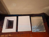 Precut white picture mattes, backboards + bags for framing -
