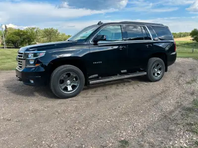 2015 Chevy Tahoe In great condition 7 seater with buckets in the middle Comes with tow kit for behin...