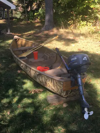 Beautiful 3 man flat back canoe with 4 hp Yamaha 4 stroke motor. Excellent condition. Might have 10...