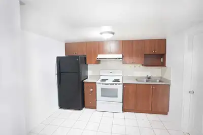 Large and spacious, self-contained, 2 BR, semi-furnished basement unit with separate entrance, in a...