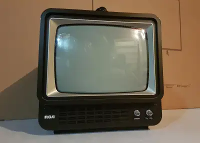 Vtg 1980s Portable B&W Television With Faux Wood Grain Model AFC-095L 12V battery power capable via...