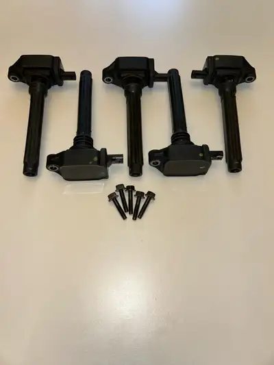 Genuine OEM Mopar Ignition Coil Packs - Set of 5 Part Numbers: • 05149168AI • Superseded / Replaced...