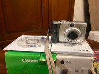 Canon PowerShot A75 Digital Camera with Samsonite 52’’ tripod