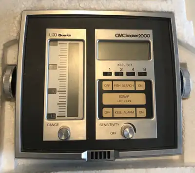Offering a vintage OMCtracker 2000 depth and fish finder 1219, a classic piece of marine technology...