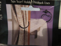 Contemporary Umbra black iron towel ring and scarf holder set.