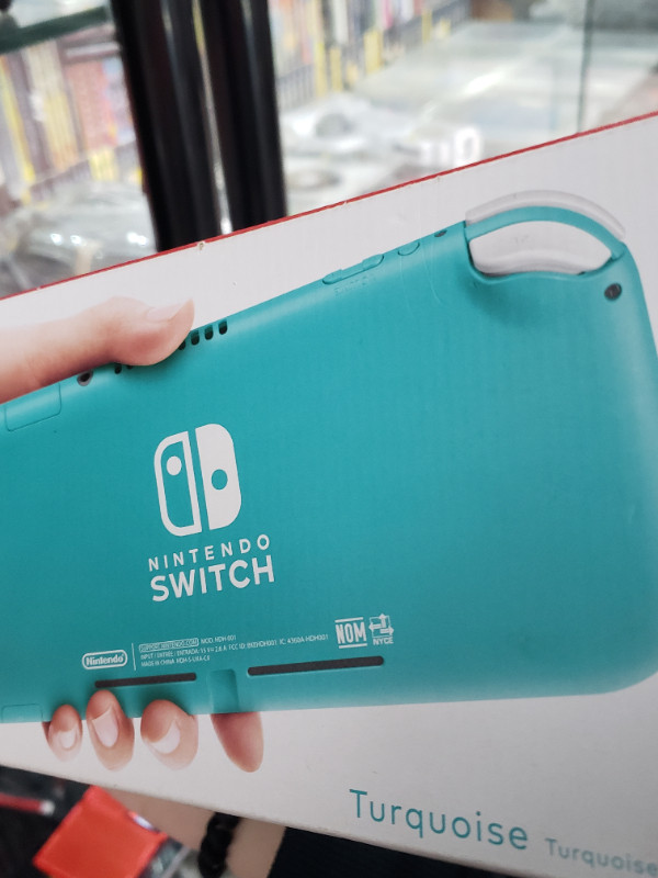 Nintendo Switch Lite with charger, case, and box in Nintendo Switch in Cole Harbour - Image 4