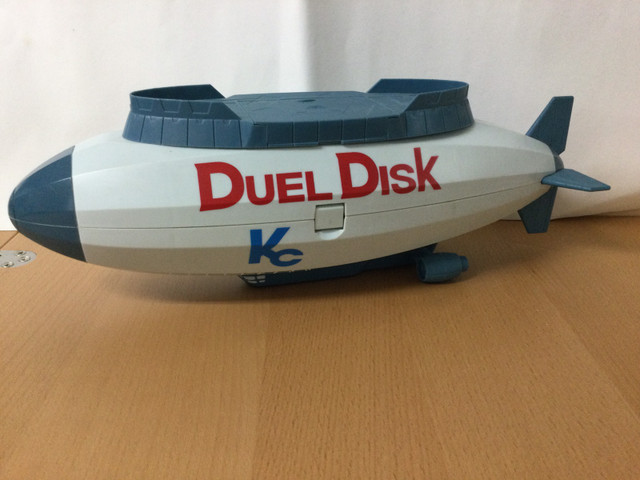 YUGIOH Duel Disk Blimp 15" Storage Case with 11 figures in Toys & Games in City of Toronto