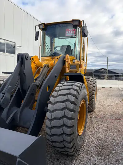 This is a Volvo L70 wheel loader, a reliable machine for various construction and loading tasks. Thi...