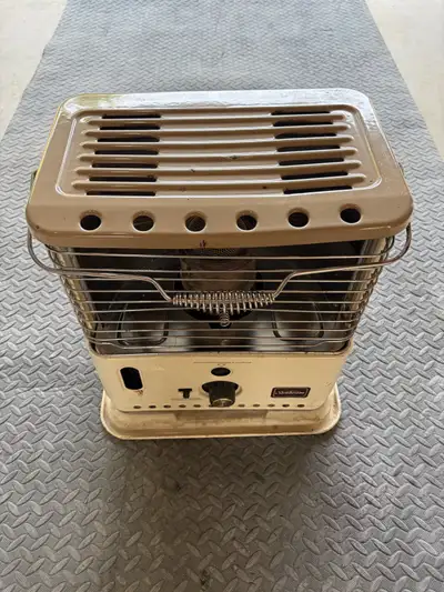 Vintage kerosene heater. Works.
