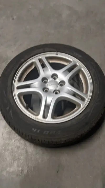 Impreza rims 2002 - 2005 with Farroad tires 205-55R-16 lightly used. $300.00 Or Best Offer. Rims fro...