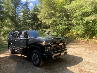 2024 Chevy Silverado 2500 HD crew cab “Custom”, gas engine with 71,000km. Comes with rear fibreglass...