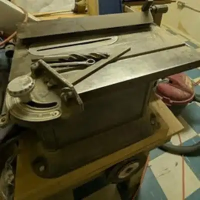 I have an older-style solid steel table saw for sale. It is very heavy and very solid. The saw itsel...
