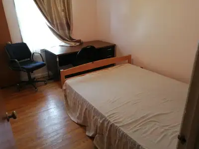 Spacious sunny comfortable bedroom on the main floor in a detached house located in beautiful lakevi...
