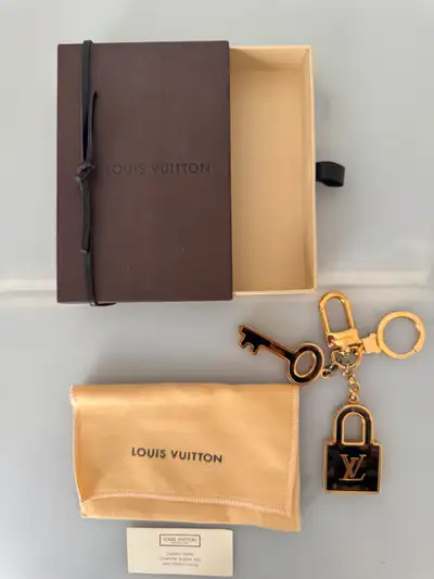 Authentic Louis Vuitton Key Chain Comes With Box and Dust Bag.