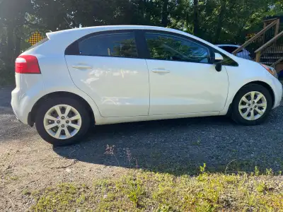 2013 KIA Rio. Good condition, clean interior, two key fobs, comes with winter tires on rims. $4000 n...