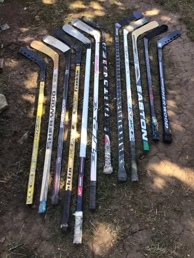 Hockey sticks , wood and composite, R/L hand,& GOALIE STICK, View more
