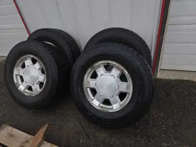Set a 4 - 265 70 17s all terrain tires are in fair shape.Probably good for another few seasons Tires...