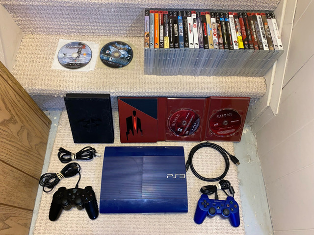 Blue PS3 slim bundle with 50+ games  in Sony Playstation 3 in St. Albert