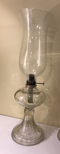 Antique clear glass oil lamp in large size. 20”x6”