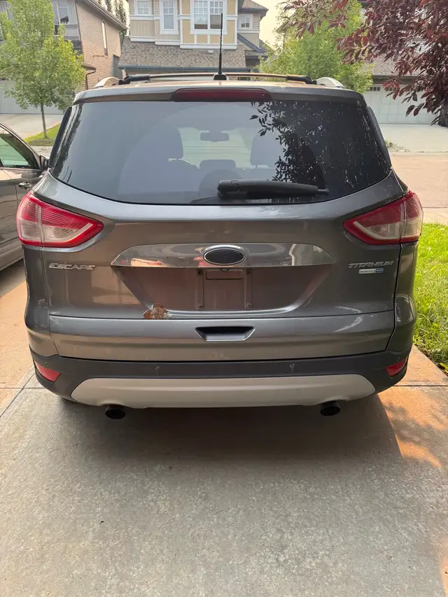 2014 Ford Escape Titanium **Rear left damage**526224465950167041