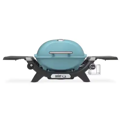 This pre-owned White (not green like photo) Weber Q 1200 portable gas grill offers a compact yet pow...