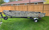 14’ aluminum boat and trailer