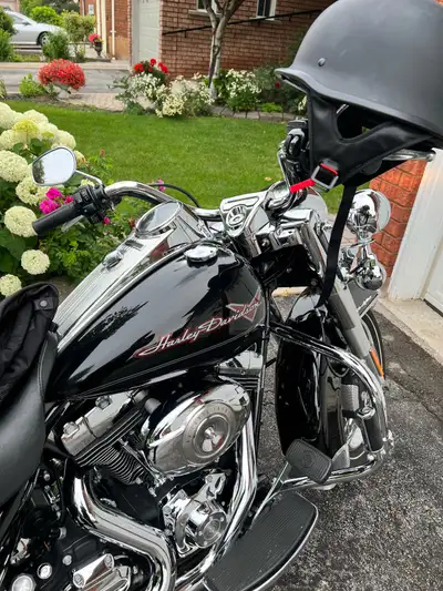 This is a 2009 Harley Davidson FLHR Road King with 60,500 km Vance & Hines Pipes. Serious Inquiries...