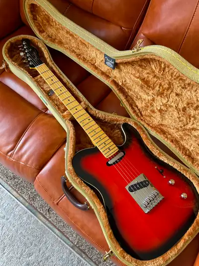 Mint showroom condition Fender Japan Aerodyne Telecaster in Hot Rod Burst finish. Fantastic sleek an...