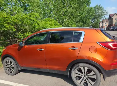 À vendre : Kia Sportage 2011 – Bon état – Couleur orange Je vends ma Kia Sportage modèle 2011, en bo...