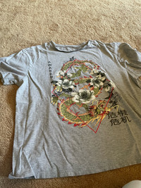  Gray T-shirt with dragon on it