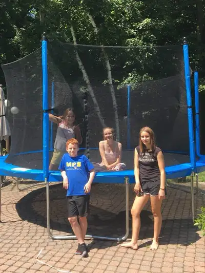 trampoline over 12’ excellent condition, View more