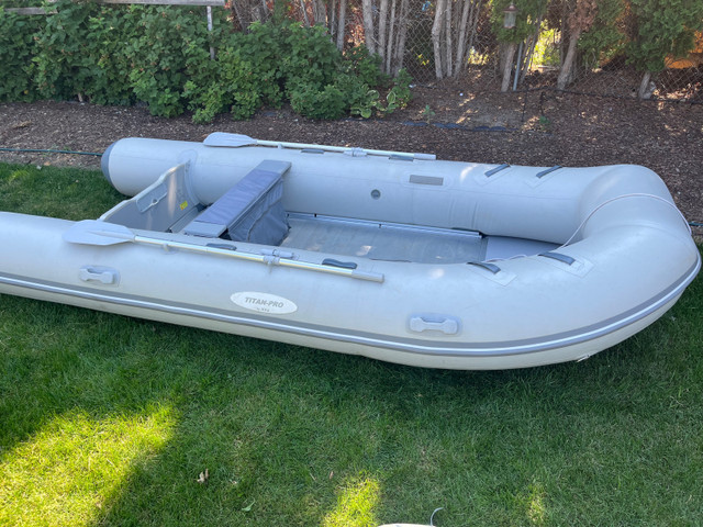12 foot Inflatable boat and motor for sale  in Powerboats & Motorboats in Kamloops