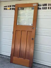 “Solid Douglas Fir Exterior Door” Approximately 32” x 80”. 