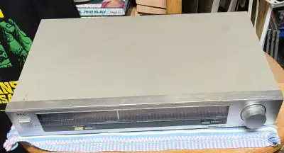 This is a vintage NEC T341E AM/FM stereo tuner, a classic piece of audio equipment for any audiophil...