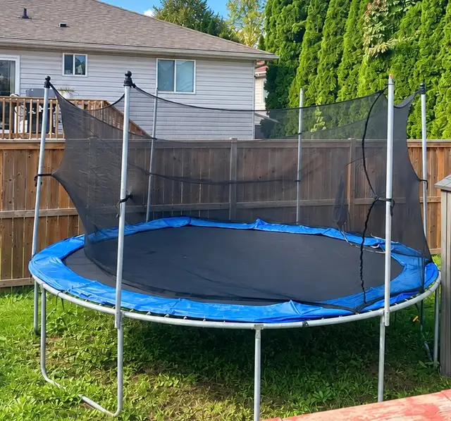 Backyard Trampoline with Safety Enclosure