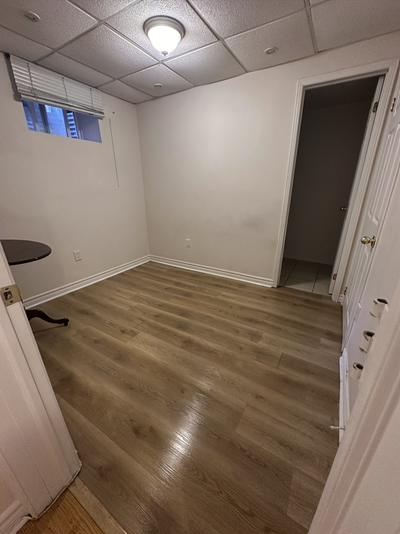 Small tasteful clean one bedroom basement apartment with great neighbors right next to a TTC bus sto...