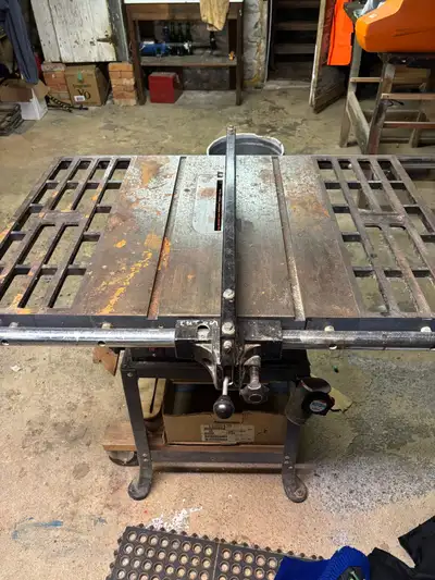 This is a Durex Industrial Delta 10" table saw, a solid tool for any woodworking shop. Model number...