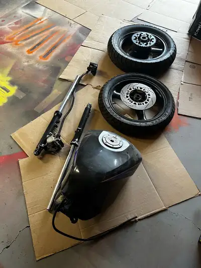 1987 ninja 250 - forks and tires. Rubber hasn’t been used but is older. 1994 ninja 250- gas tank , b...