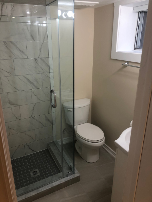 JULY 1ST Modern Basement Bachelor near Victoria Park station Long