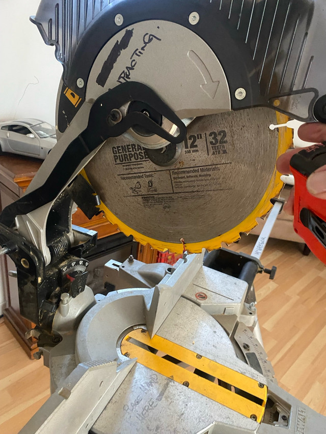 12” dewalt  miter saw with stand in Power Tools in North Bay